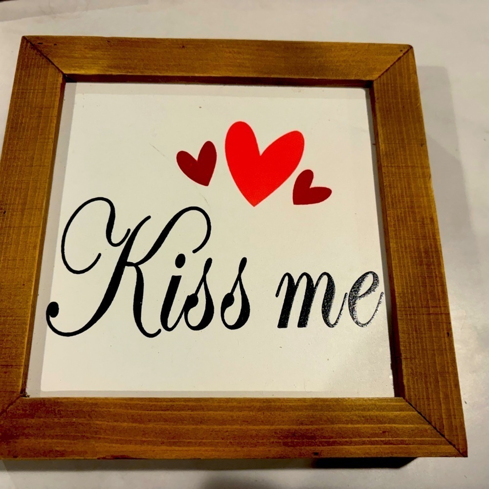Kiss me home decor sign.